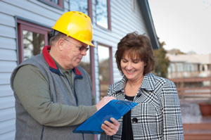 Massachusetts and Rhode Island Basement Remodeling Contractors at work at design table