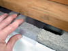 Clear plastic vapor barrier covering for block walls in Boston, Providence, Framingham
