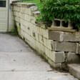a collapsing retaining wall in Falmouth