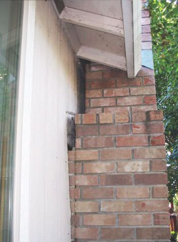 sinking, leaning chimneys that are in danger of collapse in Pawtucket