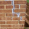Tuckpointing that cracked due to foundation settlement of a Providence home
