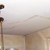 Drywall cracks in Woonsocket that were poorly patched and repaired.