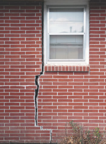 severe foundation wall cracks along a window in Coventry