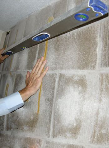 severe foundation wall failure symptoms of a basement wall in Hyannis