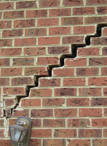 major cracking of a brick foundation wall in New Bedford