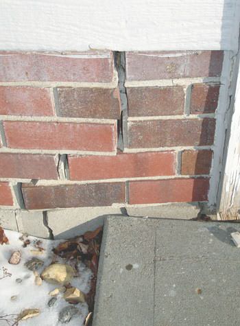 Severe street creep damage to a garage wall outside a Bridgewater home