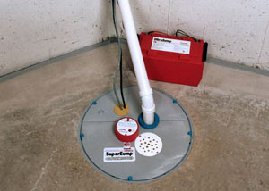 A sump pump system with a battery backup system installed in Newton