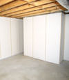 Fiberglass insulated basement wall system in Braintree, MA and RI