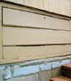 an old-fashioned crawl space door in Braintree about to be replaced