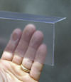Closeup of a clear plastic covering on a Shrewsbury crawl space block wall
