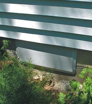 A gray crawl space vent cover in Weymouth