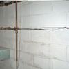 Severe foundation damage from a long crack in a bucking wall of a Woonsocket home.