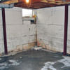 Rusted, corroded i-beams found with a failing foundation in a Cape Cod home.