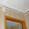 The ceiling and wall separating as the wall sinks with the slab floor in a Fall River home