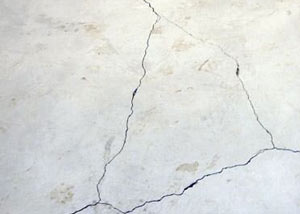 cracks in a slab floor consistent with slab heave in Brookline.