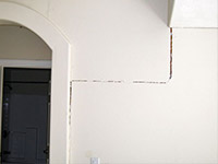 Drywall cracking due to foundation settlement in Westerly