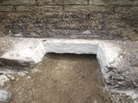 Preparing the foundation footing for a home foundation repair in Newport