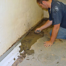 Testing a French drain system in a Shrewsbury home.