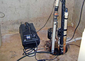 Pedestal sump pump system installed in a home in Quincy