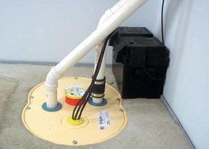 Quincy installation of a submersible sump pump system