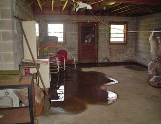 a flooded basement floor in a Westport home