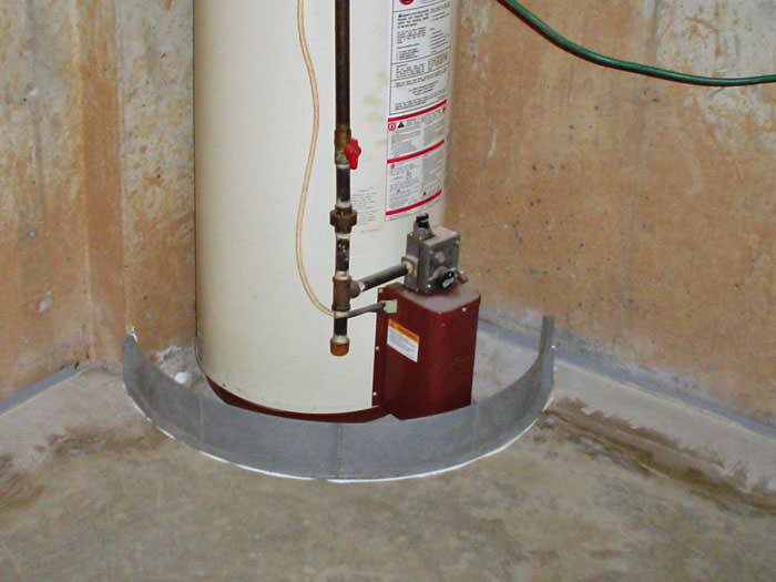 Floodring Water Heater Flood Protection In Ma And Ri An Old Outdated Water Heater System That Is Protected By The Floodring