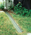 A recessed gutter drain extension installed in Westport, Massachusetts and Rhode Island