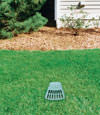 A buried gutter drain downspout extension installed in a Westport home